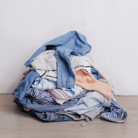 Pile of laundry representing how old jeans are like old 401(k)s.