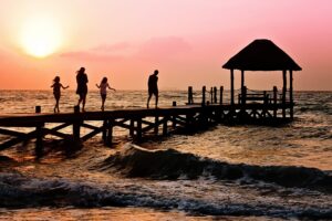 family, children, woman, man, happy, ocean, holiday, pier, silhouette, sunrise, beach, dock, brown beach, brown happy, brown sea, brown sunrise, brown ocean, nature, brown happiness