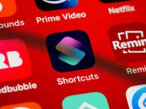 Close-up view of various app icons on a smartphone home screen.